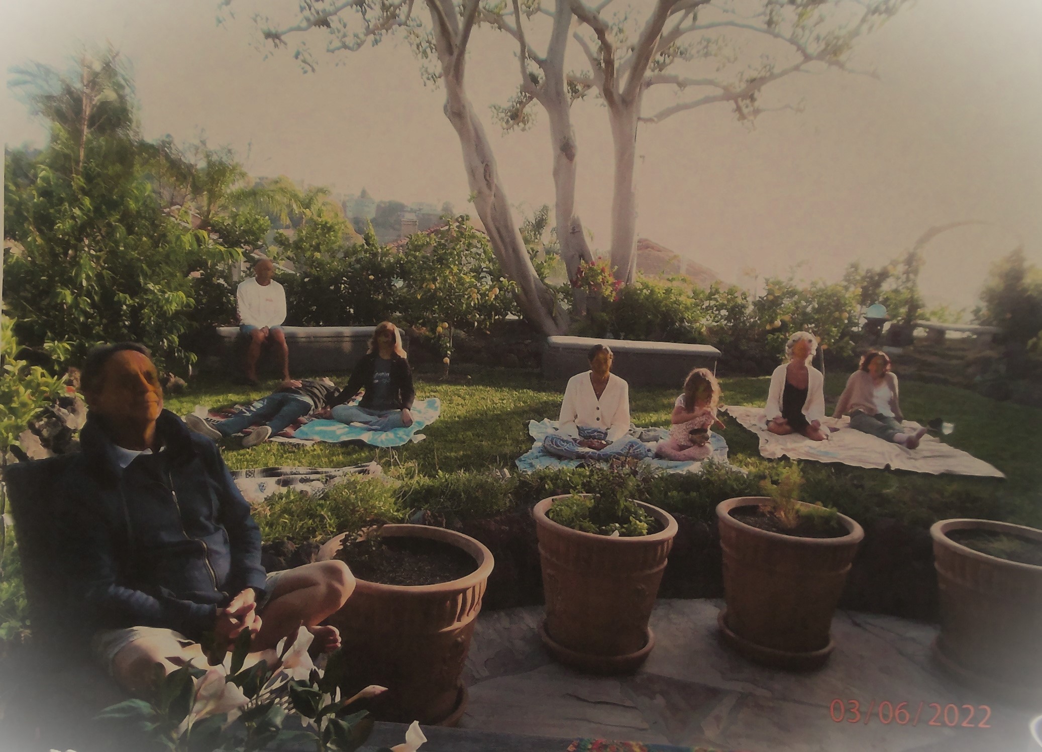 Group backyard setting for a sunset Sound Bath Meditation.