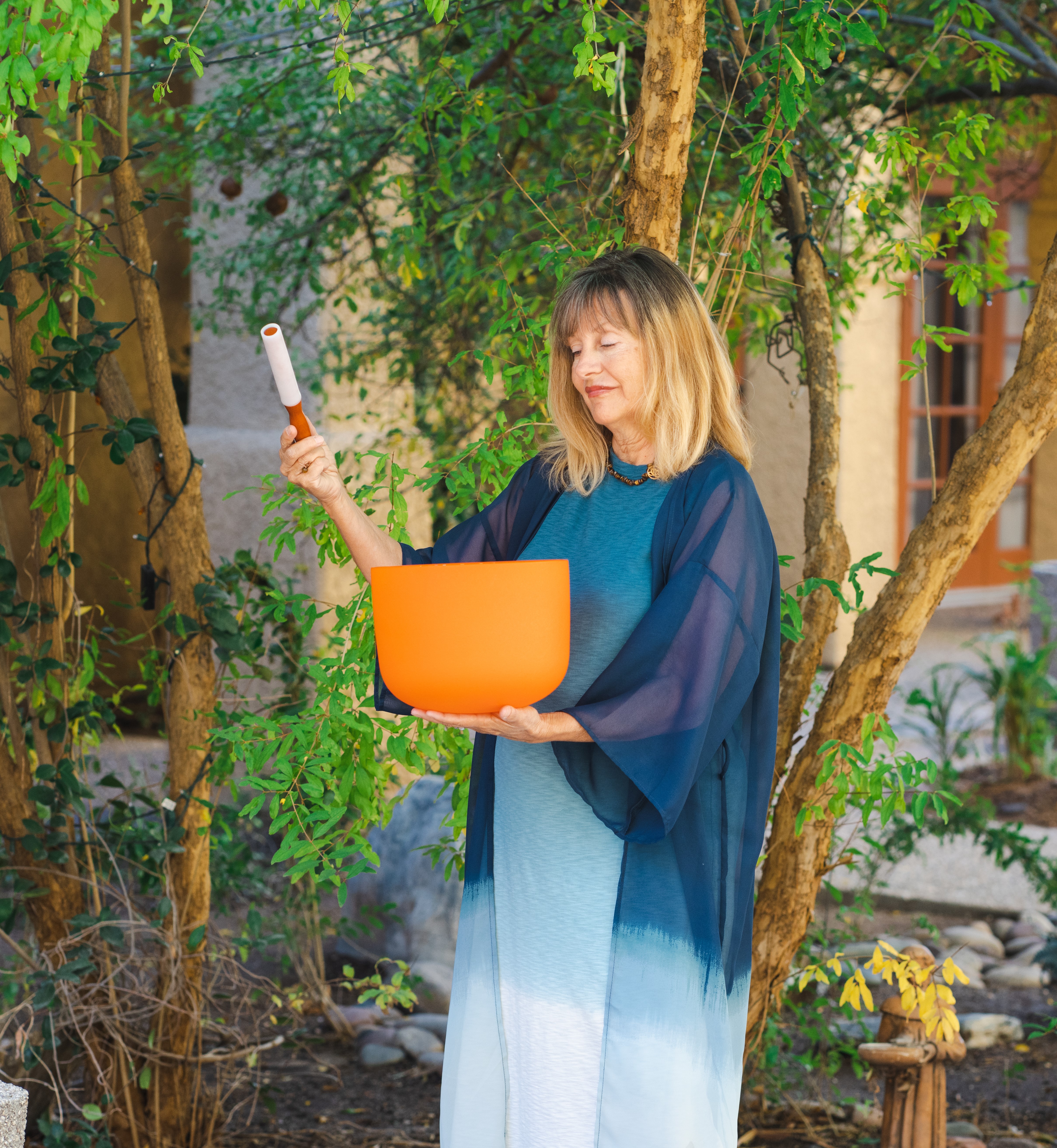 Kat Styrcula Internationally Certified Integral Sound Healer with a sacral chakra bowl.